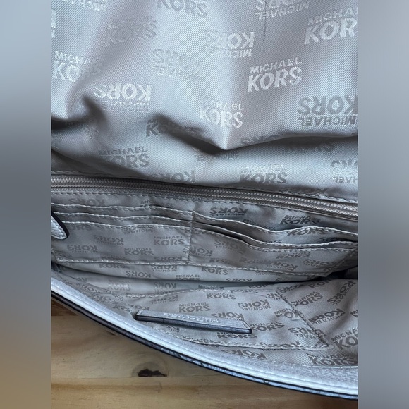 Michael Kors Pebbled Leather Clutch with Removable Strap - Picture 12 of 16